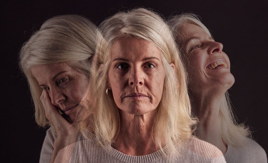 Senior woman, bipolar or mental health for depression, psychology or mood swings. Mature female, de